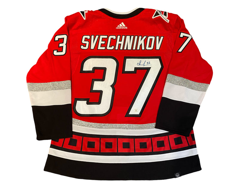 Jersey Adidas del 25º aniversario de los Carolina Hurricanes autografiado por Andrei Svechnikov-1